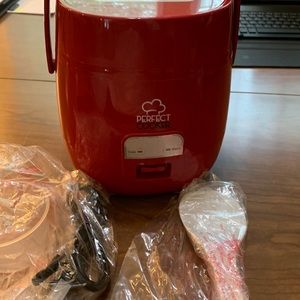 Never been used rice cooker. No manual unfortunately…